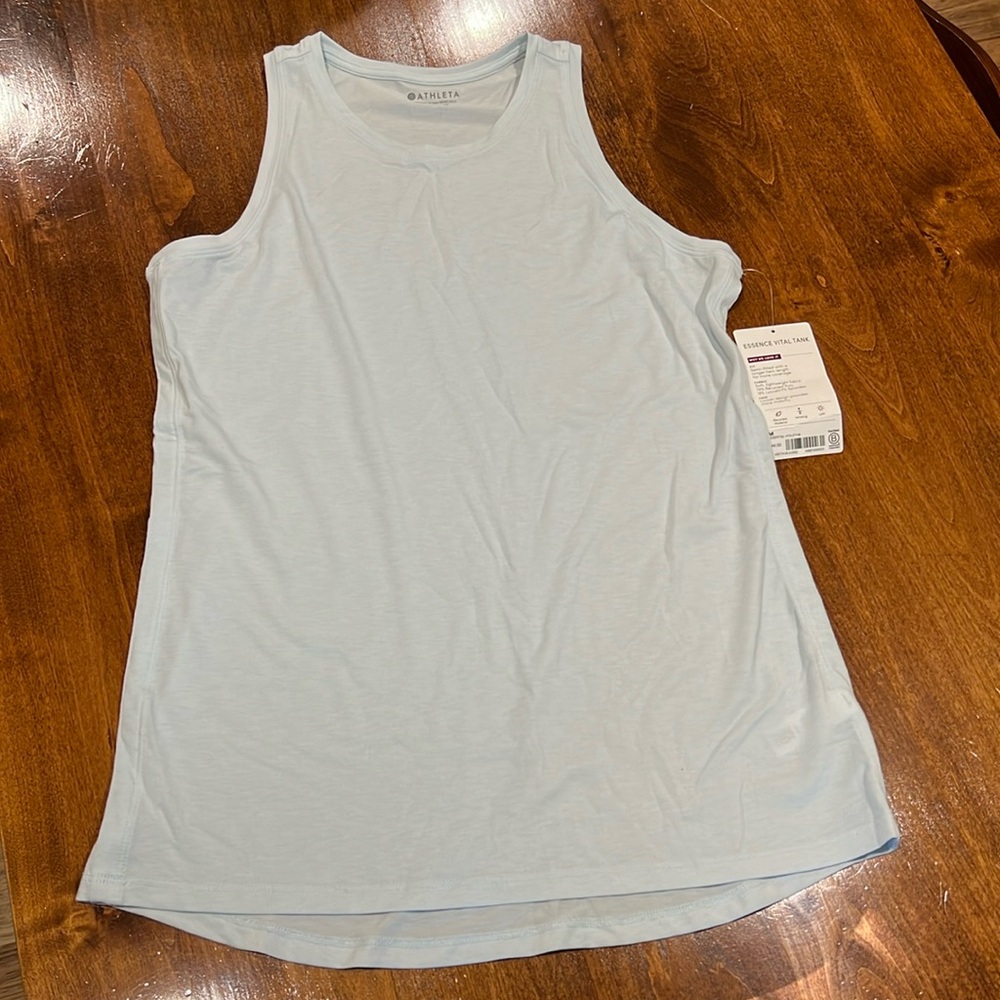 Women’s Athleta tank top. Long to cover your assets. Pale blue. Size Medium. New